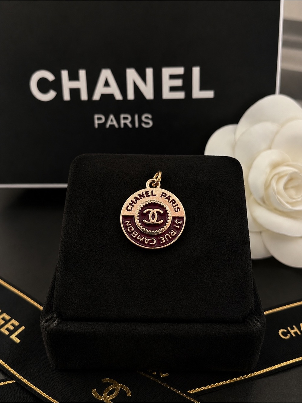 Chanel stamped Paris Gold & Burgundy Round Charm pendant zipper pull